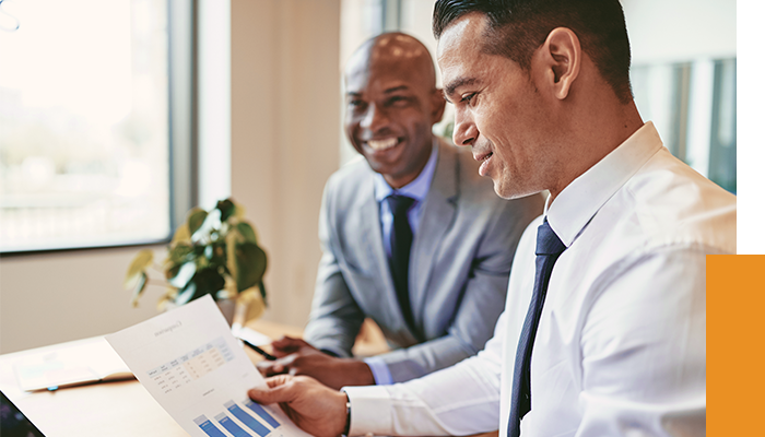 Two business men working towards excellence