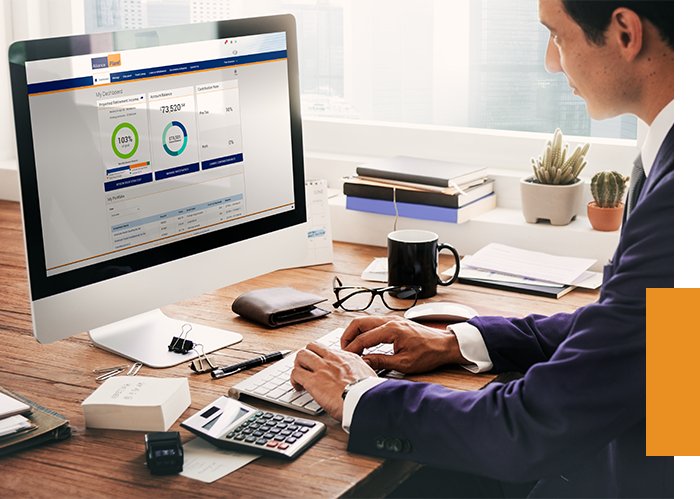 Advisor using a computer and the Alliance Plan website